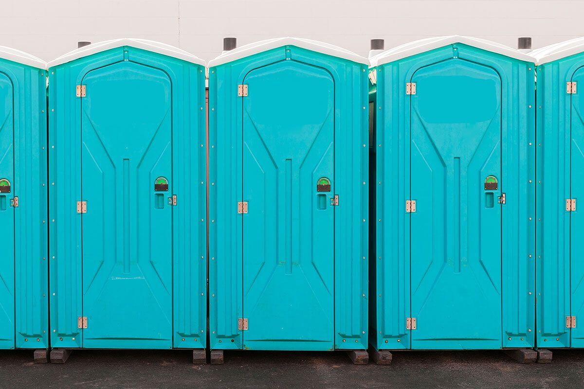 Industrial portable restroom units at a plant in Minot, North Dakota